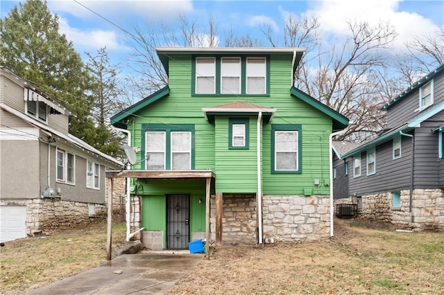 view of front of house featuring central AC unit