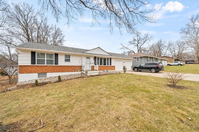 ranch-style house featuring a garage and a front yard