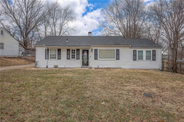 single story home with a front yard