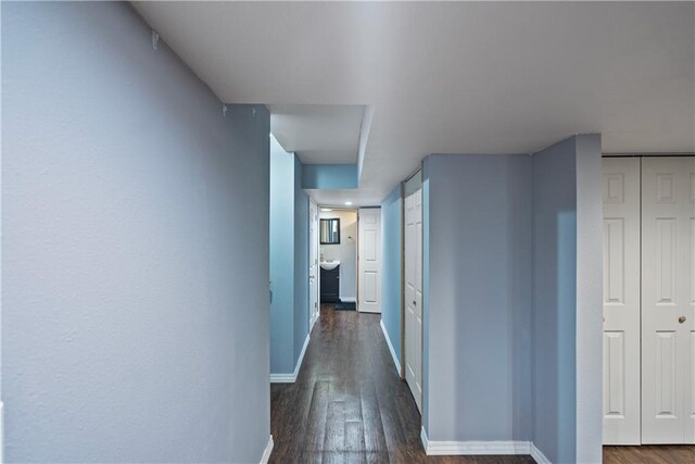 hall featuring dark hardwood / wood-style floors