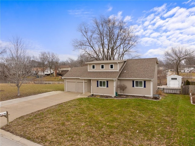 front of property featuring a garage and a front yard