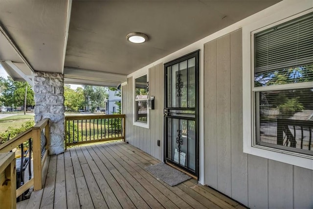 wooden terrace with covered porch