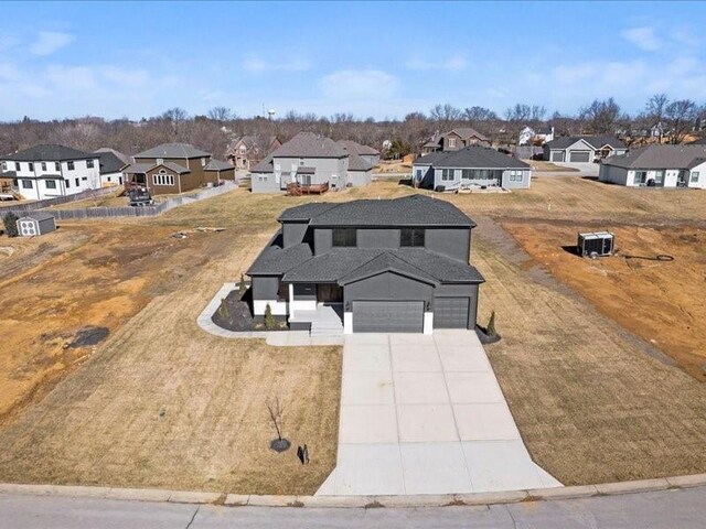 drone / aerial view with a residential view