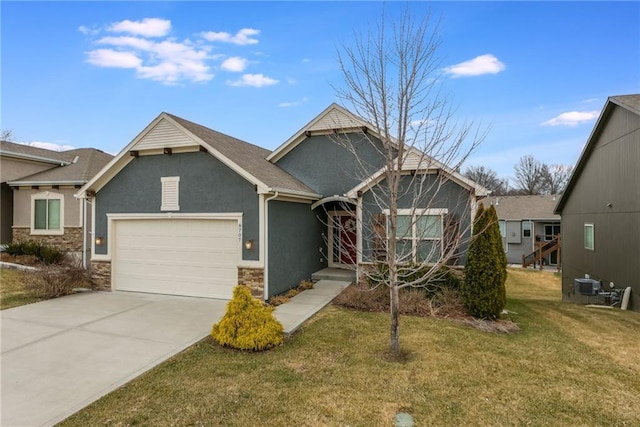 craftsman-style house featuring stucco siding, an attached garage, stone siding, driveway, and a front lawn