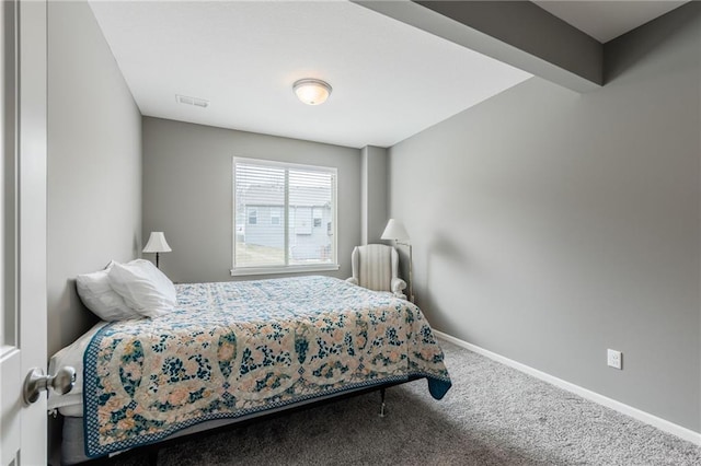 bedroom featuring baseboards, visible vents, and carpet flooring