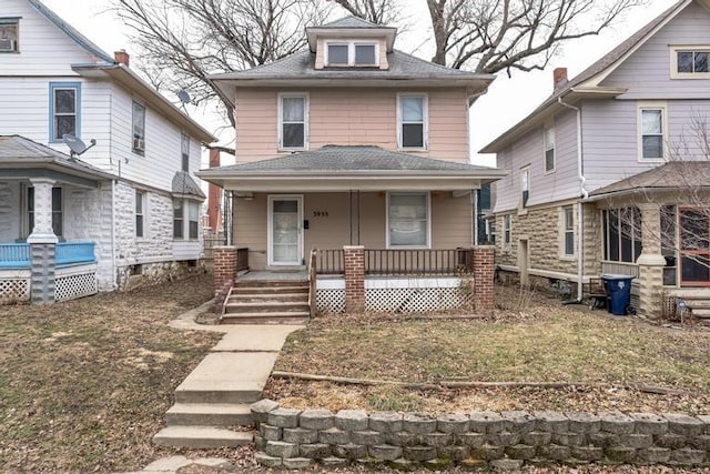 view of front of property featuring covered porch