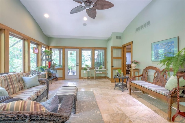 18402 W 64th St, Shawnee, KS 66218 - sunroom / solarium featuring high vaulted ceiling, healthy amount of natural light, recessed lighting, stone finish flooring, and baseboards