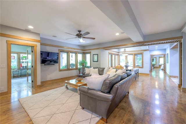 18402 W 64th St, Shawnee, KS 66218 - living room featuring healthy amount of natural light, recessed lighting, ceiling fan, and baseboards