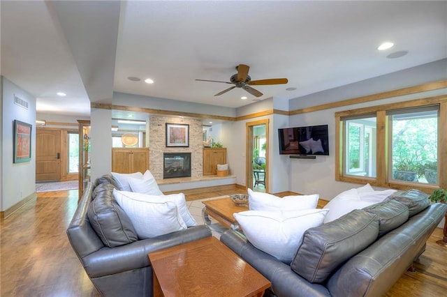18402 W 64th St, Shawnee, KS 66218 - living room with baseboards, recessed lighting, a ceiling fan, and light wood-type flooring