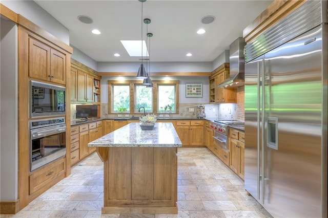 18402 W 64th St, Shawnee, KS 66218 - kitchen featuring built in appliances, wall chimney range hood, open shelves, stone tile flooring, and a warming drawer