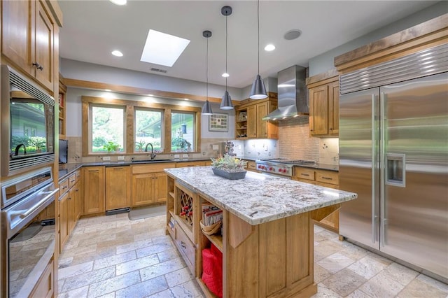 18402 W 64th St, Shawnee, KS 66218 - kitchen featuring built in appliances, open shelves, wall chimney range hood, stone tile flooring, and recessed lighting