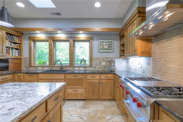 18402 W 64th St, Shawnee, KS 66218 - kitchen with a sink, open shelves, wall chimney range hood, stainless steel gas stovetop, and recessed lighting