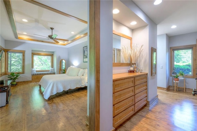 18402 W 64th St, Shawnee, KS 66218 - bedroom featuring wood finished floors, recessed lighting, and a raised ceiling