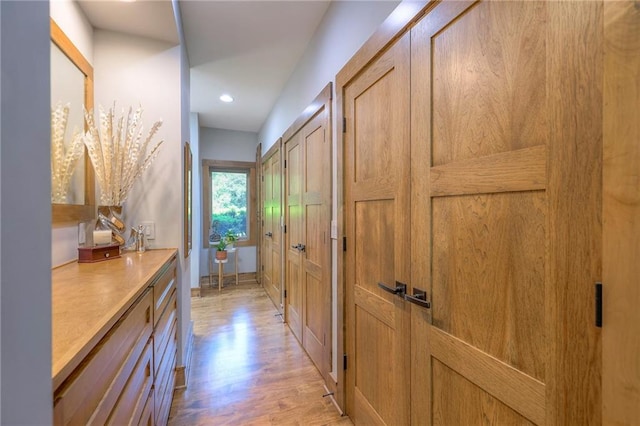 18402 W 64th St, Shawnee, KS 66218 - corridor featuring light wood-style flooring and recessed lighting