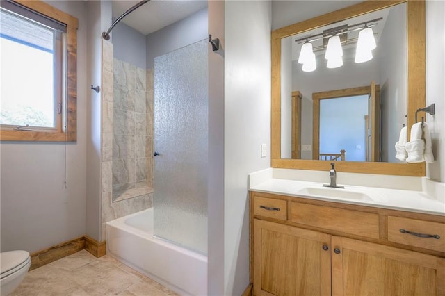 18402 W 64th St, Shawnee, KS 66218 - bathroom with toilet, baseboards, vanity, shower / washtub combination, and tile patterned floors