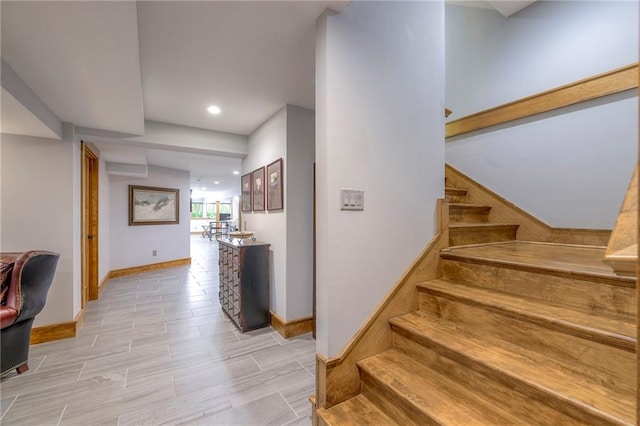 18402 W 64th St, Shawnee, KS 66218 - stairs featuring baseboards and recessed lighting