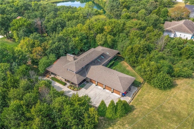 18402 W 64th St, Shawnee, KS 66218 - view of subject property with a large body of water and a heavily wooded area