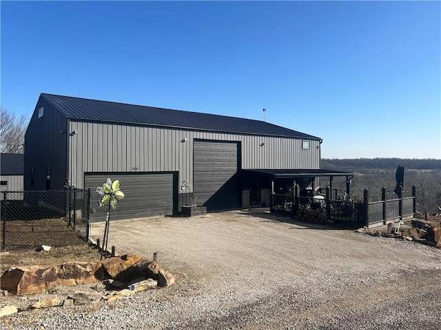 view of outbuilding with a garage