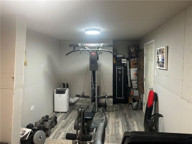 workout room with wood finished floors