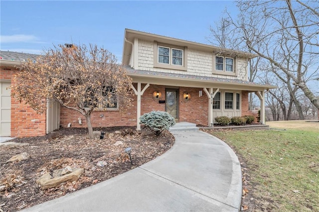 front of property featuring a porch and a front lawn