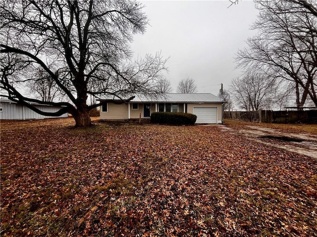 ranch-style home with a garage