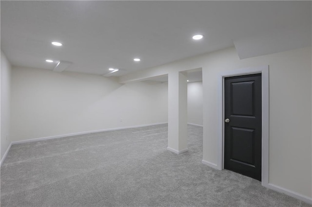 finished basement featuring baseboards, carpet flooring, and recessed lighting