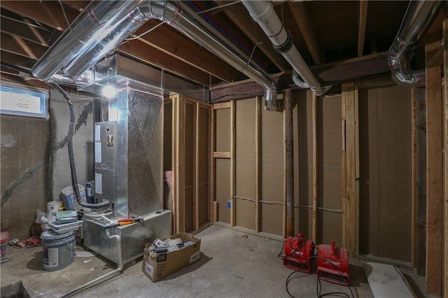 basement featuring heating unit