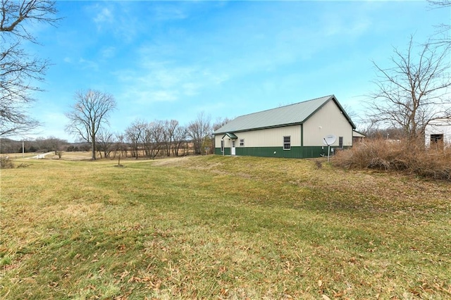 view of yard with a rural view