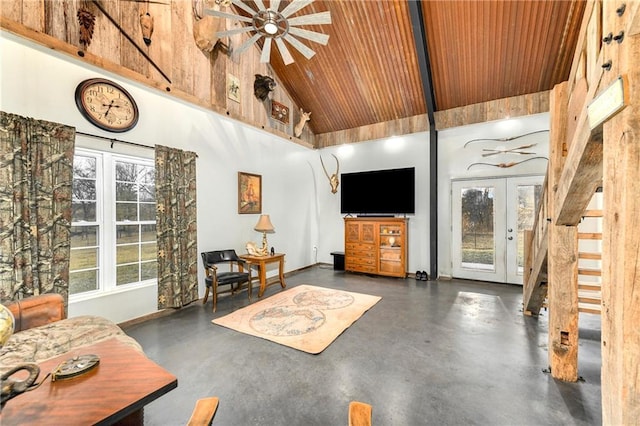 living room featuring a healthy amount of sunlight, wooden ceiling, high vaulted ceiling, and french doors