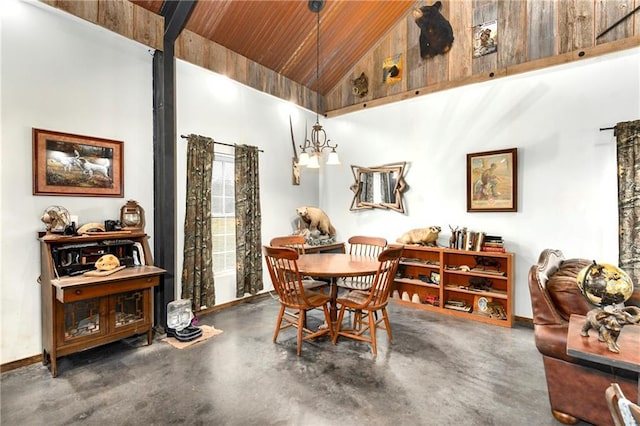 dining space featuring beam ceiling, wooden ceiling, and high vaulted ceiling