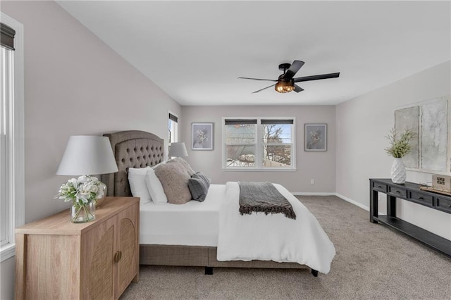 bedroom with carpet, baseboards, and ceiling fan