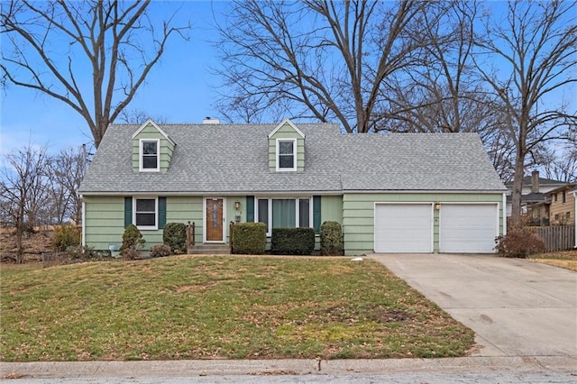 cape cod-style house with a garage and a front lawn