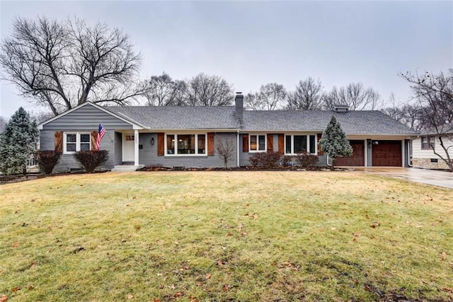 single story home with a garage and a front yard