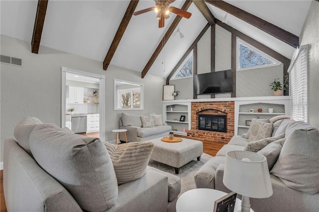 living room featuring visible vents, ceiling fan, beamed ceiling, wood finished floors, and high vaulted ceiling