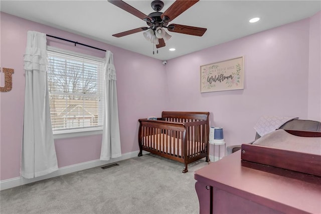 bedroom featuring visible vents, baseboards, ceiling fan, light colored carpet, and recessed lighting