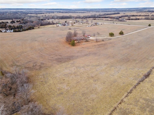 birds eye view of property featuring a rural view