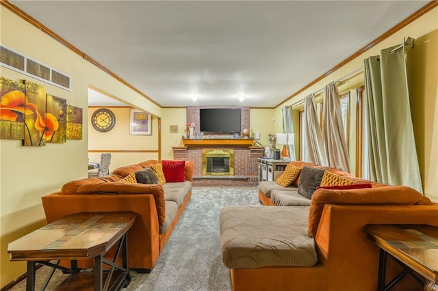 living room featuring ornamental molding, carpet floors, and a fireplace