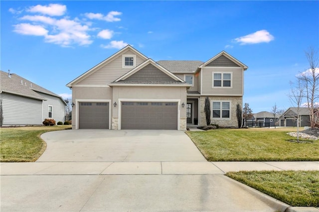 craftsman-style house featuring stone siding, driveway, an attached garage, and a front lawn