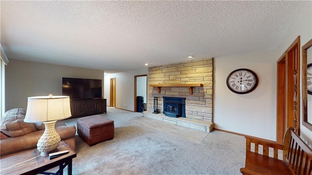 carpeted living room featuring a textured ceiling