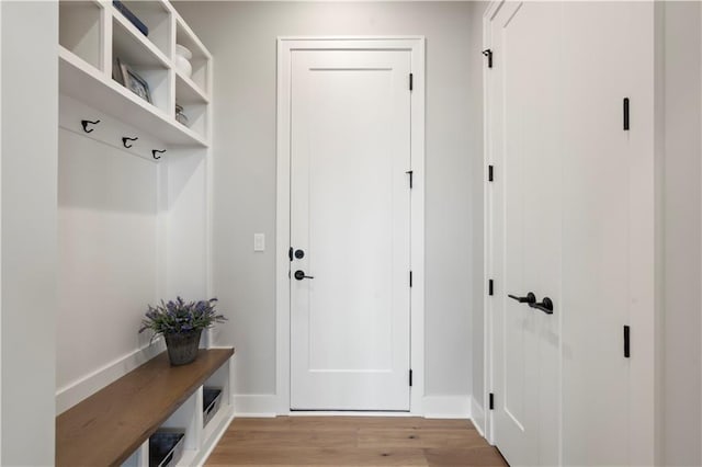 mudroom with light hardwood / wood-style flooring