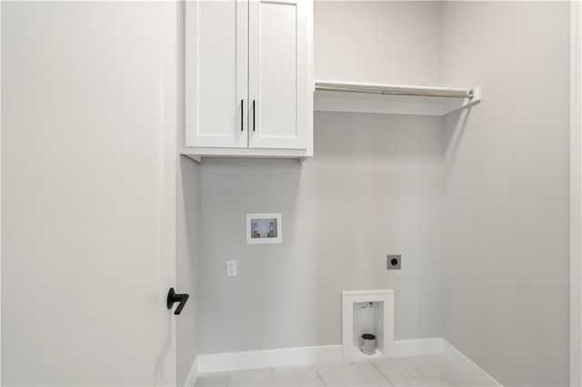 laundry room with cabinets, electric dryer hookup, and washer hookup