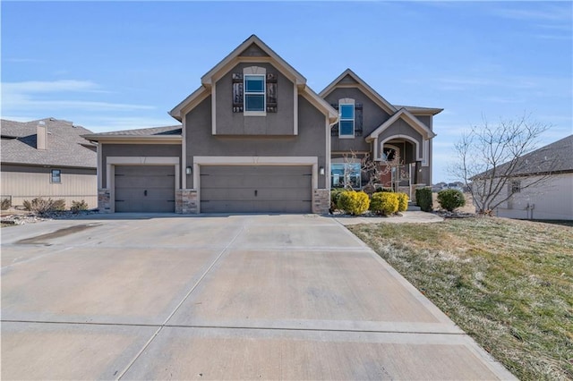 craftsman-style house featuring a garage, concrete driveway, stone siding, stucco siding, and a front yard