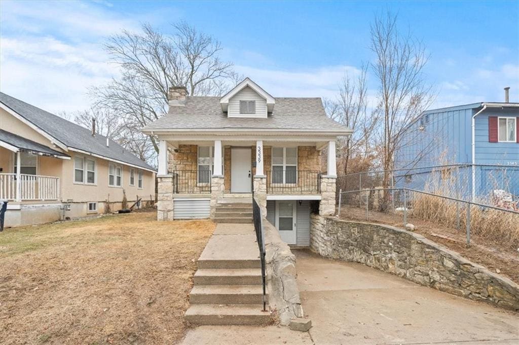 bungalow-style house featuring covered porch