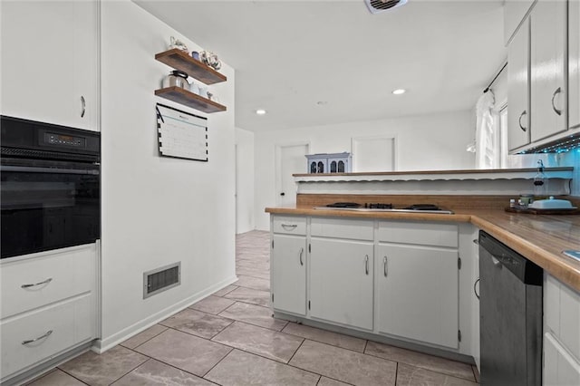 kitchen with visible vents, oven, dishwasher, stainless steel gas stovetop, and white cabinets