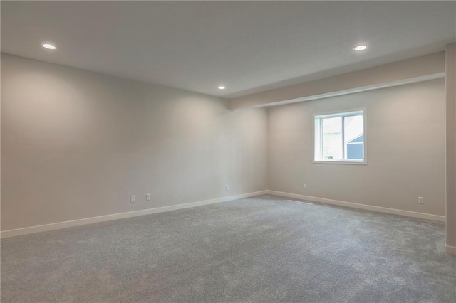 unfurnished room with recessed lighting, carpet floors, and baseboards