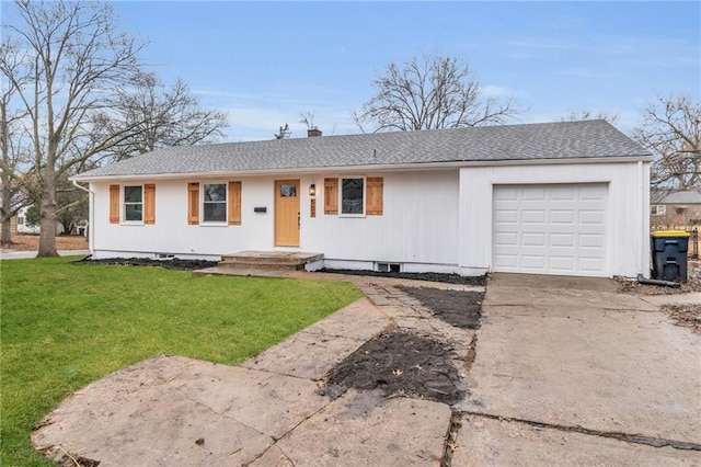 ranch-style house featuring a garage and a front yard