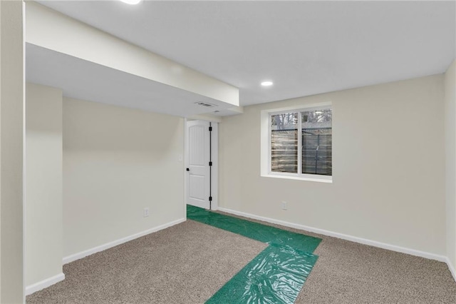 basement with dark carpet