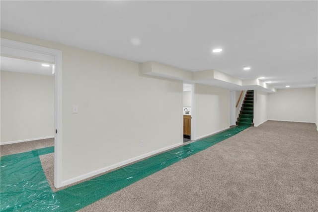 basement with carpet floors