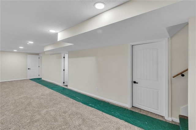 basement with carpet flooring