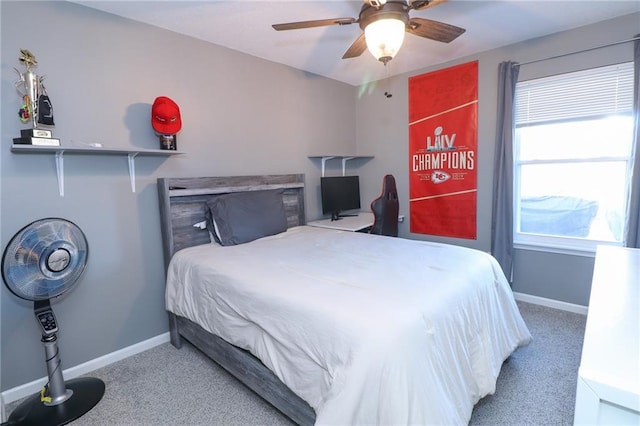 carpeted bedroom with ceiling fan